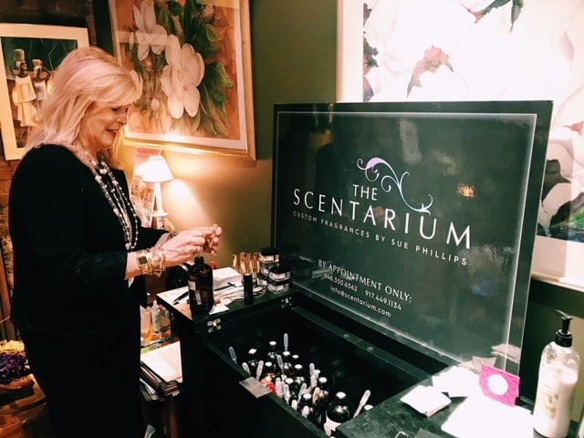 Sue Phillips Scentrepreneur mixing custom fragrances